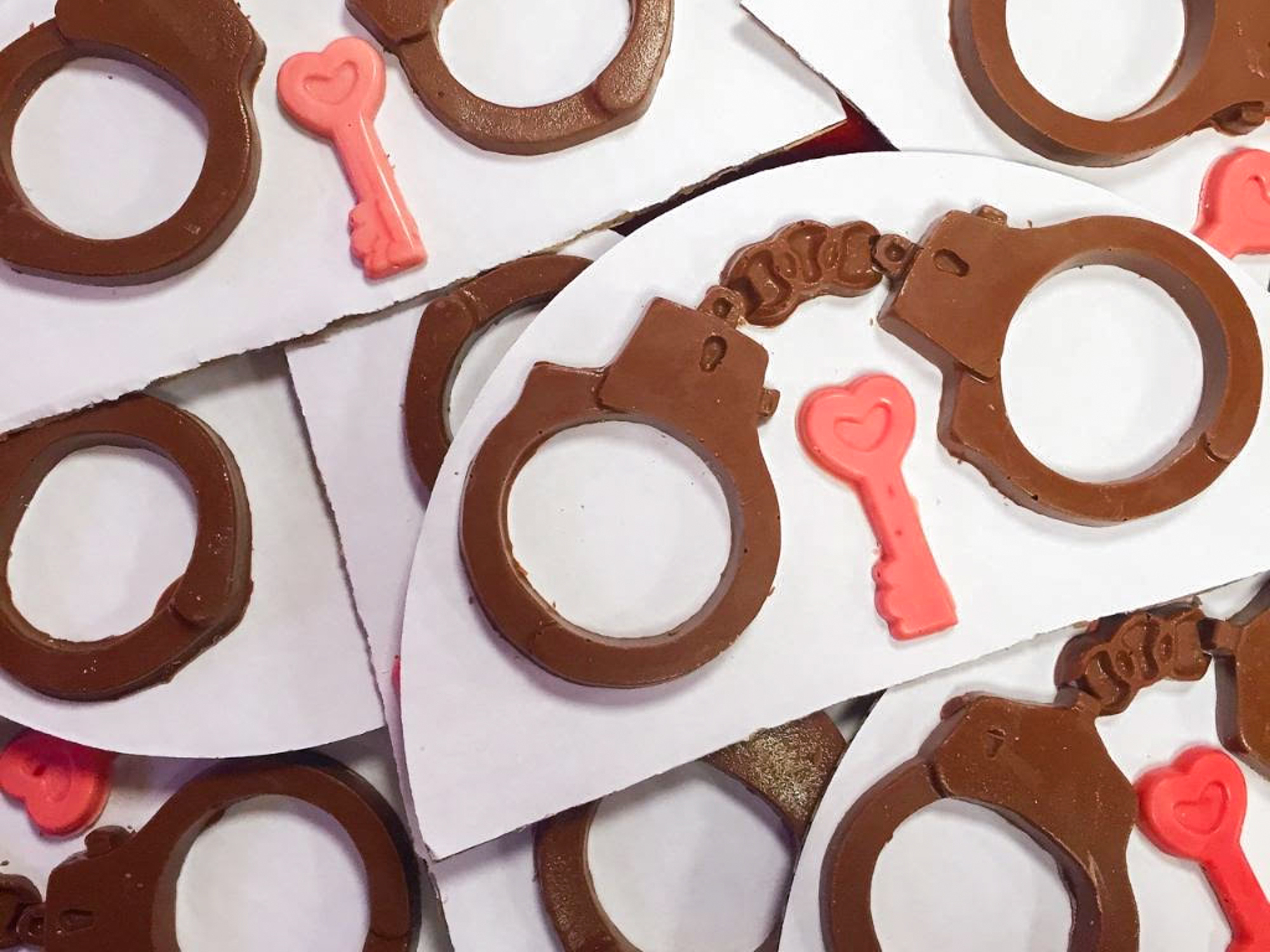 Sweet n' Nasty molds hundreds of adult chocolates in house, including these handcuffs and keys — which are used to top bachelorettes' cakes or sold on their own with the phrase, "Eat your way out!" Sweet n' Nasty molds hundreds of adult chocolates in house, including these handcuffs and keys — which are used to top bachelorettes' cakes or sold on their own with the phrase, "Eat your way out!"