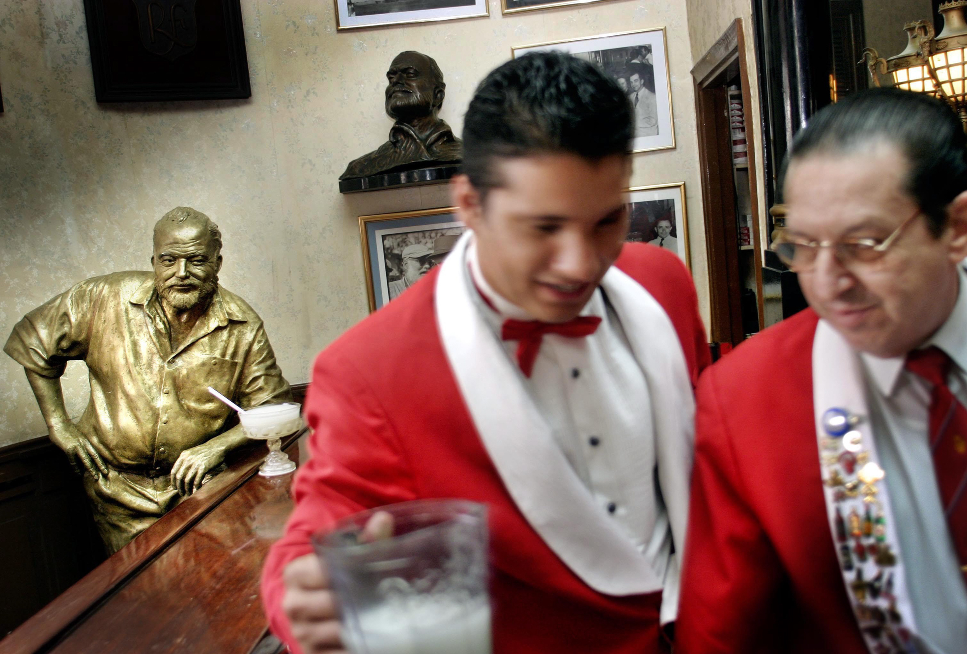 A life-size bronze statue of Ernest Hemingway leans on the bar at the author's regular spot at El Floridita, where every day a daiquiri is set before it. The Cocktail King Of Cuba: The Man Who Invented Hemingway's Favorite Daiquiri | WGBH | Craving Boston